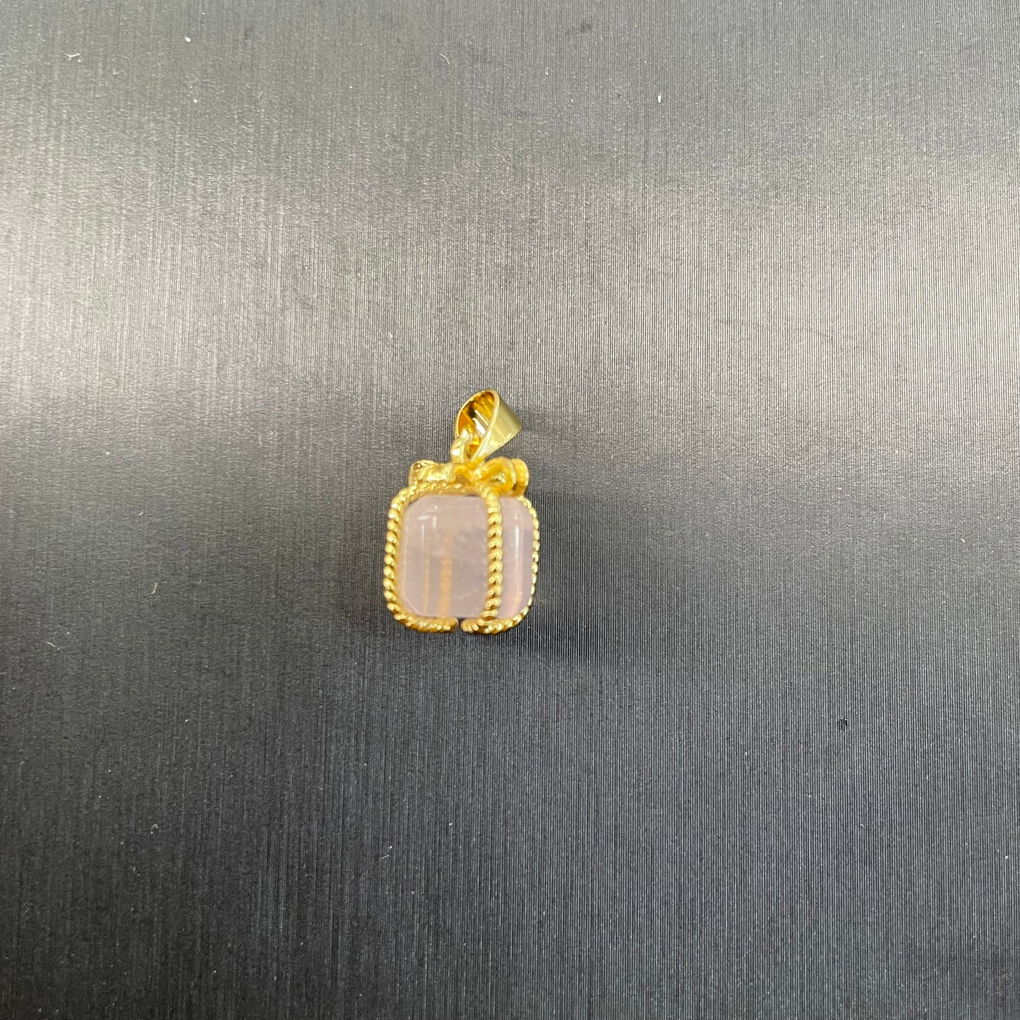 Rose quartz gift Bo’s pendant