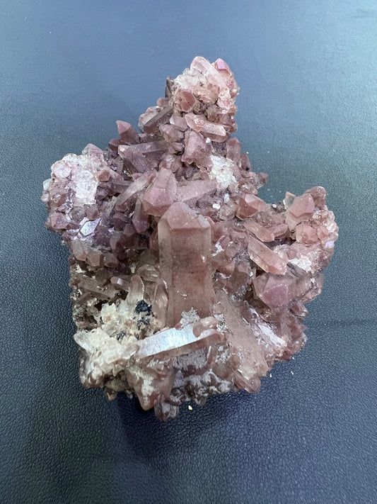 Red quartz cluster specimen